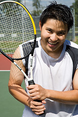 Image showing Young asian tennis player