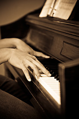 Image showing Playing piano