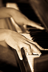 Image showing Playing piano