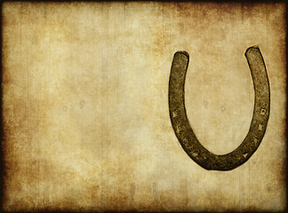 Image showing old horseshoe on paper or parchment