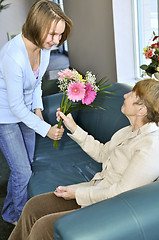 Image showing Granddaughter visiting grandmother