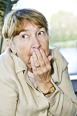 Image showing Scared elderly woman