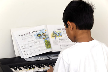 Image showing Playing the keys