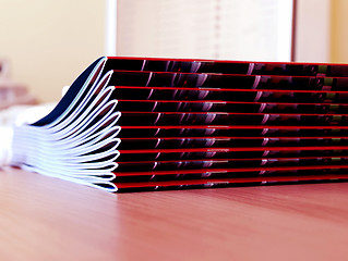 Image showing New magazines pile