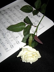 Image showing Hymn sheet music and rose