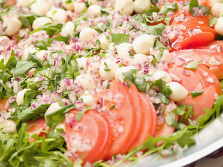 Image showing Delicious colourful salad with tomato