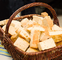 Image showing Basket of home made  bread on a table