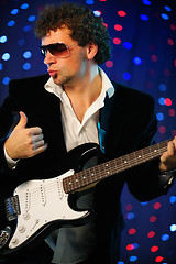 Image showing male guitar player