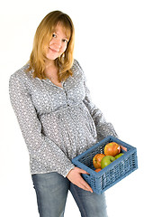 Image showing pregnant woman with apples
