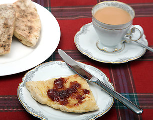 Image showing Soda farl, jam and tea