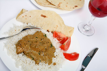 Image showing Chicken korma with wine angled