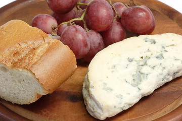 Image showing Mold cheese with grapes