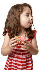 Image showing Little girl tasty sweet doughnut