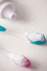 Image showing toothpaste and toothbrushes