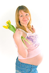 Image showing pregnant woman with tulips