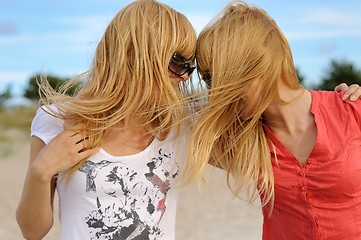 Image showing Blond twins having fun on the beach