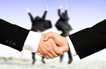 Image showing Success businessmen shaking hands