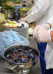 Image showing chef preparing sandwich 