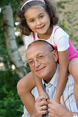 Image showing Happy grandfather and kid outdoors