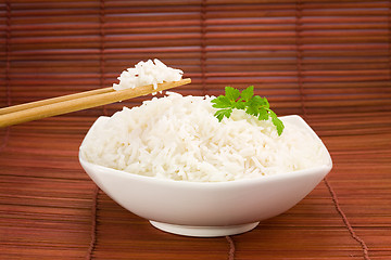 Image showing Bowl of rice on mat