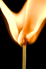 Image showing Igniting match