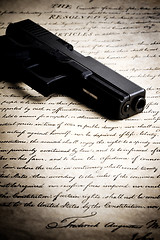 Image showing gun on constitution