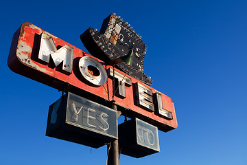 Image showing retro motel sign blue sky