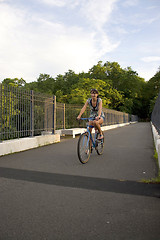 Image showing Girl Riding Her Bike