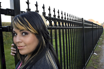 Image showing Girl by the Fence