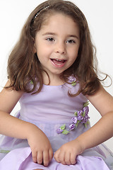 Image showing Happy joyous young girl playing
