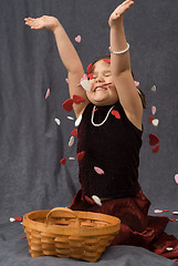 Image showing Child Throwing Confetti