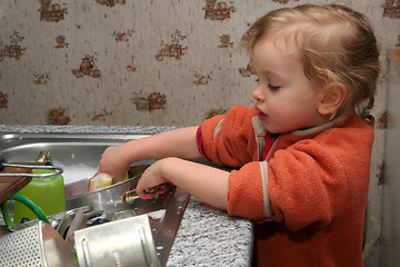 Image showing Washing the dishes