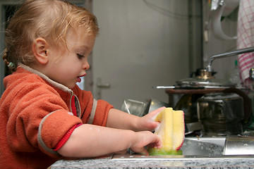 Image showing Washing the dishes