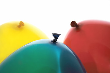 Image showing blue, yellow and red balloons