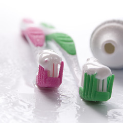 Image showing toothpaste and toothbrushes