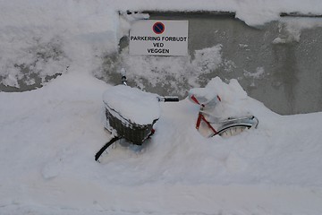 Image showing Bike covered in snow