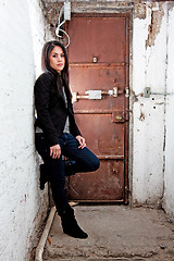 Image showing Girl in front of door