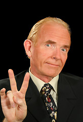 Image showing Peace Sign Businessman