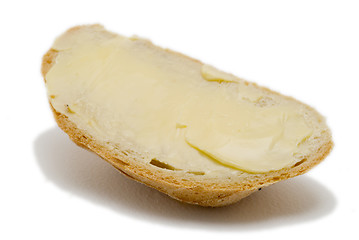 Image showing Buttered bread crust