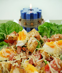 Image showing Caesar Salad And Candle