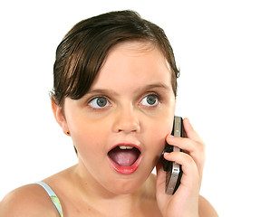 Image showing Surprised Little Girl On Phone