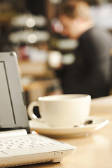 Image showing Laptop on the coffee table