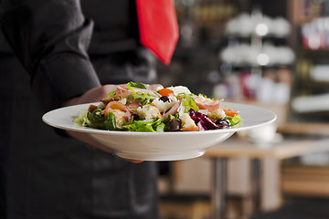 Image showing Salad and waiter