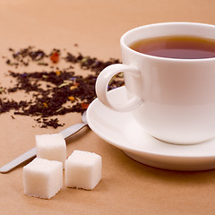 Image showing cup of tea and sugar