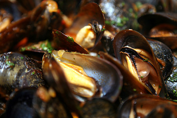 Image showing Mussels Bowl with Spice Sauce, soft focus