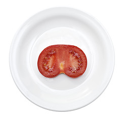 Image showing slice of ripe tomato in plate
