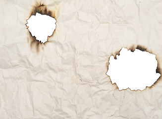 Image showing burned holes