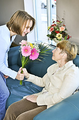 Image showing Granddaughter visiting grandmother