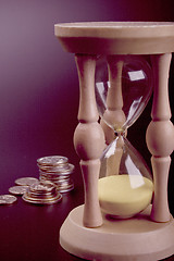 Image showing sand clock and coins