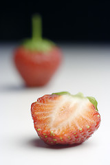 Image showing one and a halfs strawberries